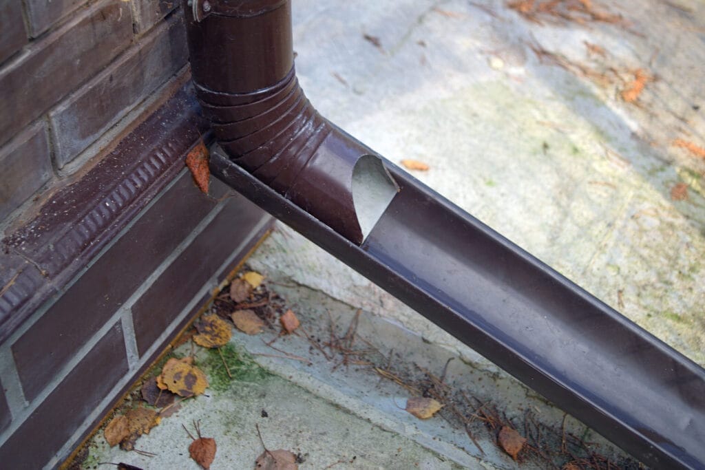 Gutter downspout with an extension added.