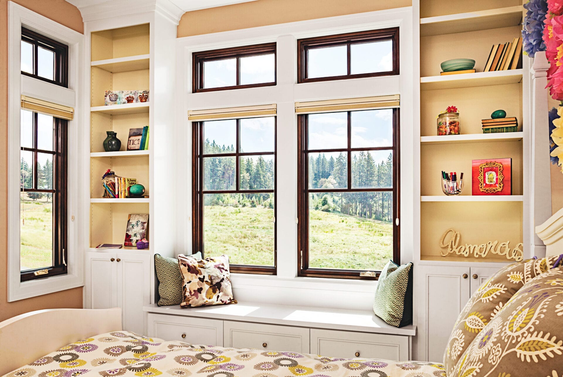 A room with 2 shelving units with fiberglass windows in between them.