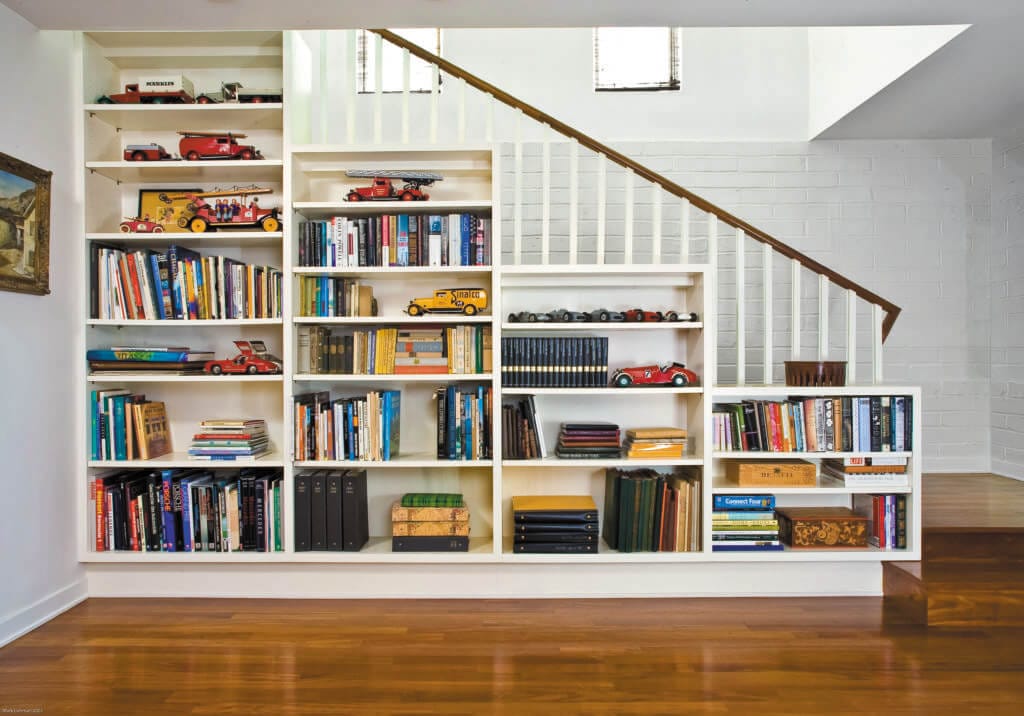 Storage shelves built below a stairwell.