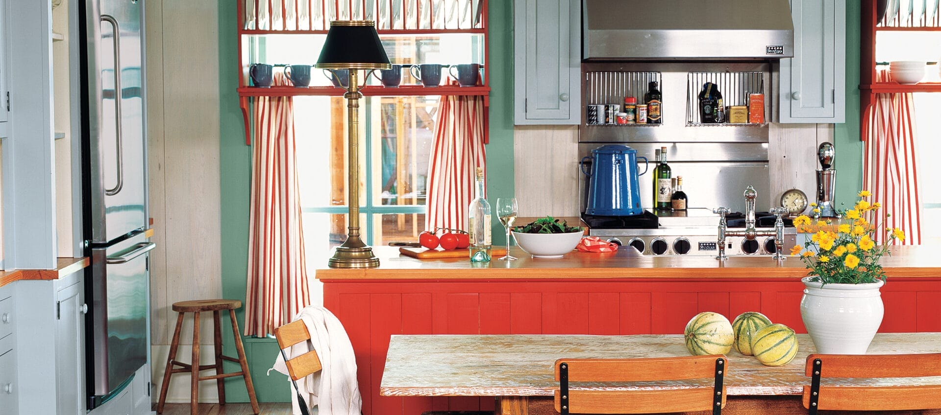 A rustic and colorful cottage kitchen.