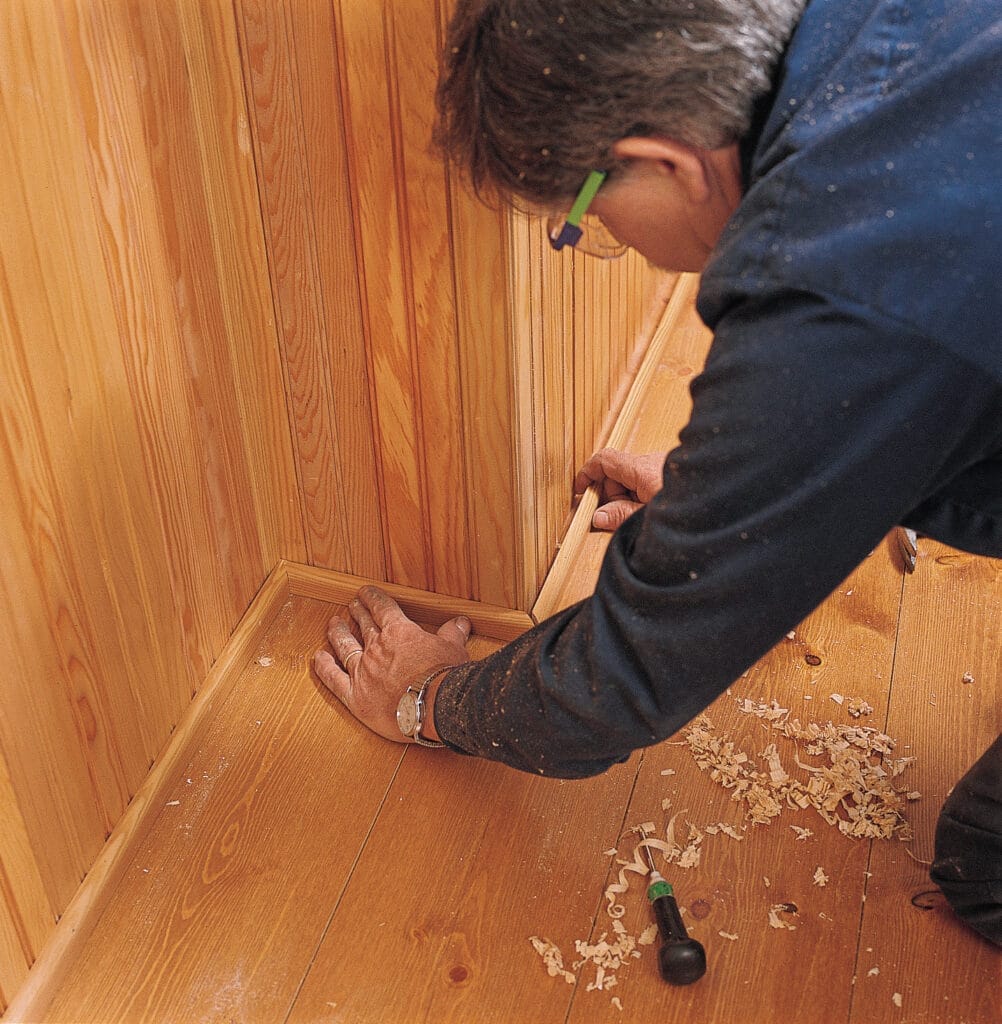 image of Tom Silva demonstrating how to install beadboard wainscoting