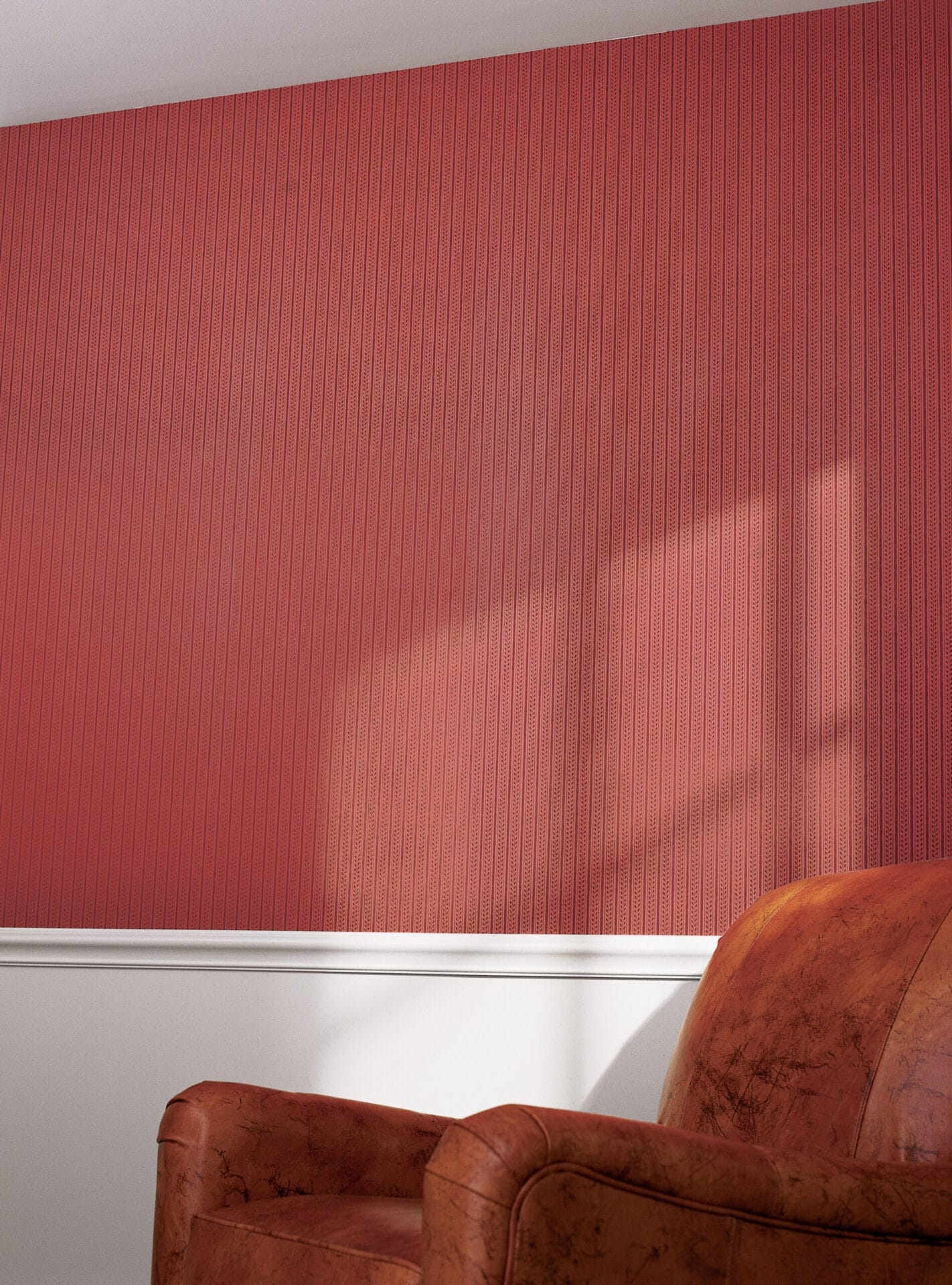 Red patterned wallpaper hanging on the wall of a room.