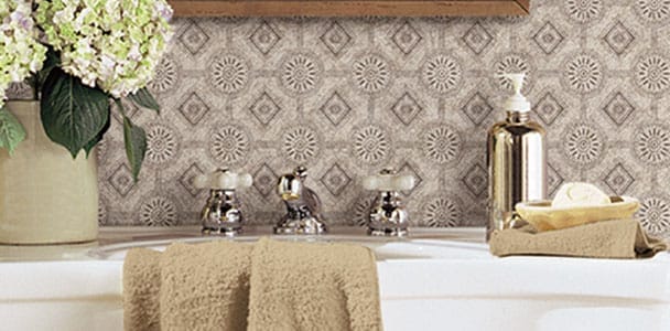 Wallpaper in a powder room bathroom.