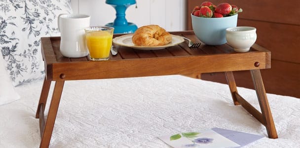 Folding serving tray being used for breakfast in bed.