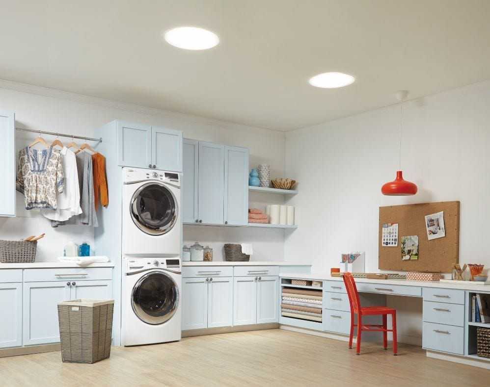 Laundry room brightened up by two sun tunnels. 