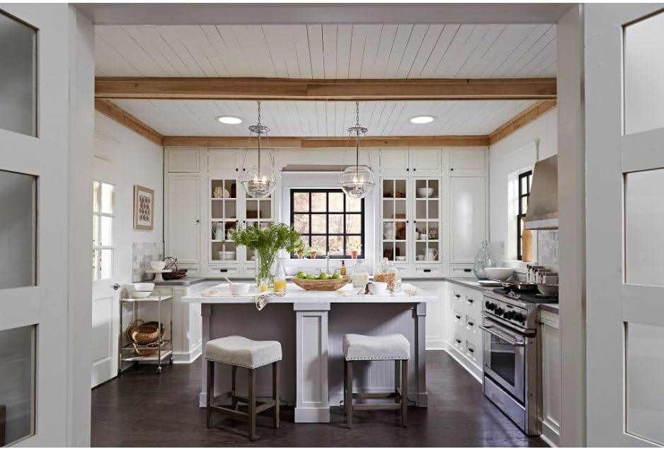 White kitchen with lots of natural light coming from sun tunnels.