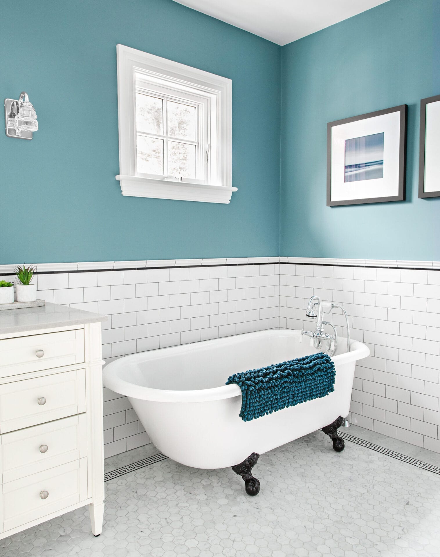 Master bathroom with refinished claw-foot tub from salvage yard.