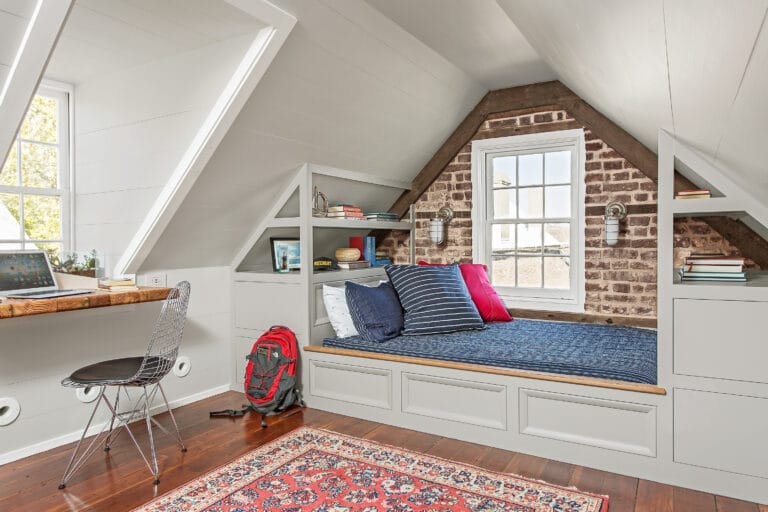 Third-floor teenage bedroom with space-saving built-in bed, storage drawers, and desk area.