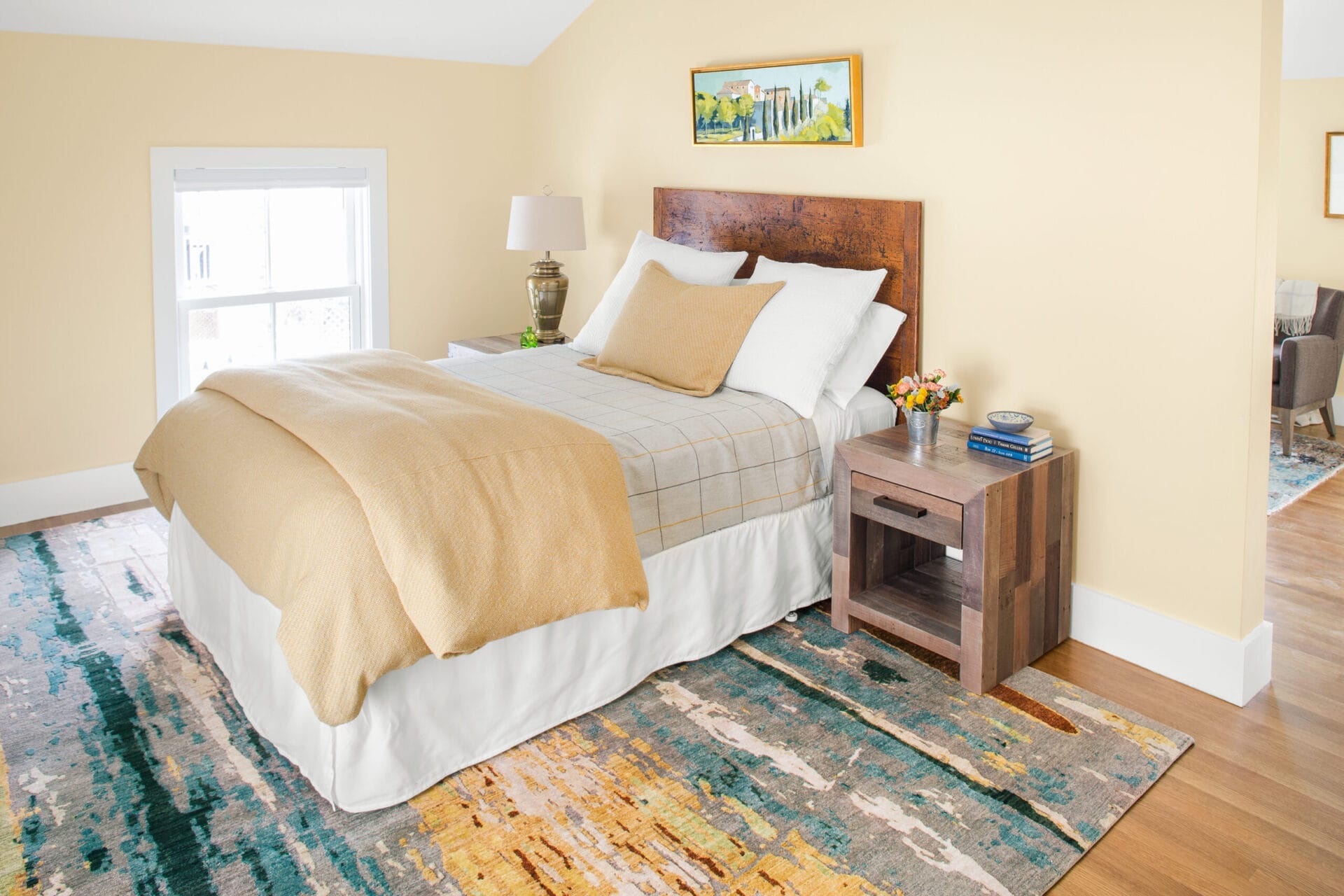 Guest bedroom with neutral gray and beige color palette.