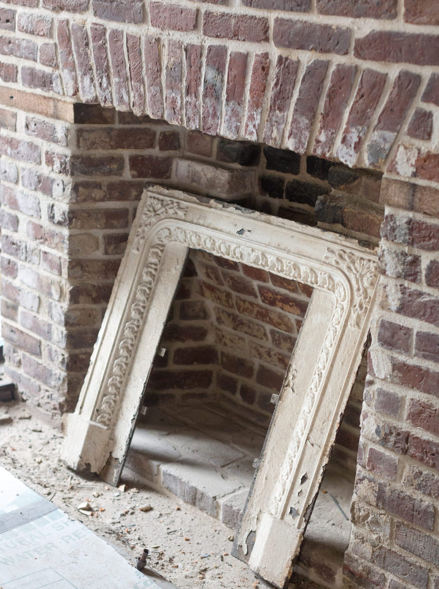 Cast-iron fireplace surround.
