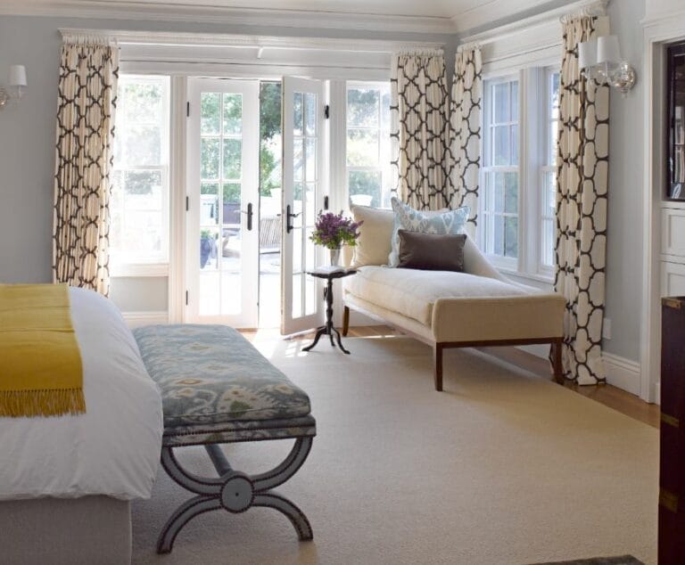 A bedroom with a yellow and brown color scheme.