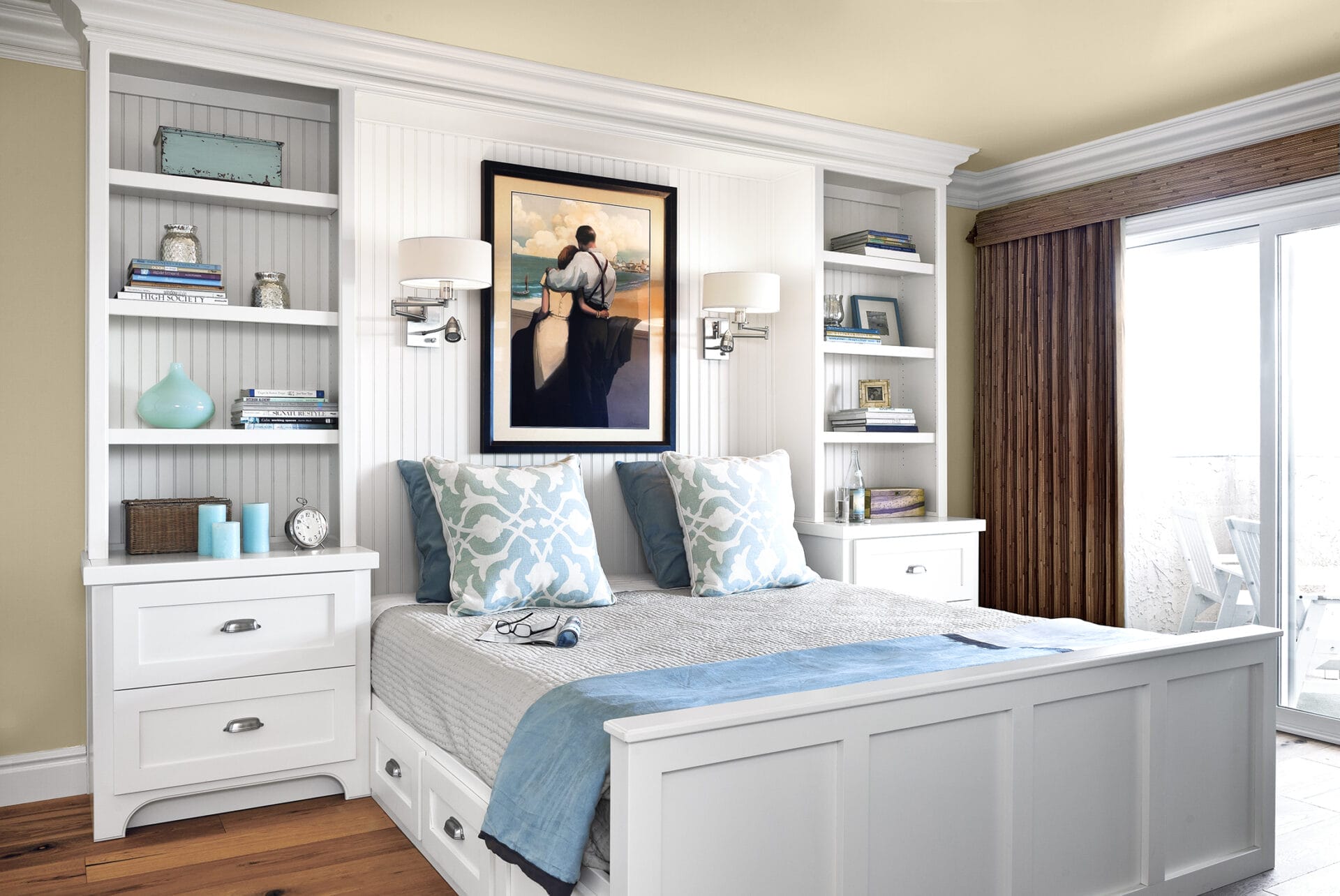 An organized bedroom with shelves and a window.