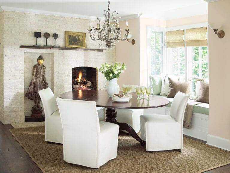 A round dining room table and chairs.
