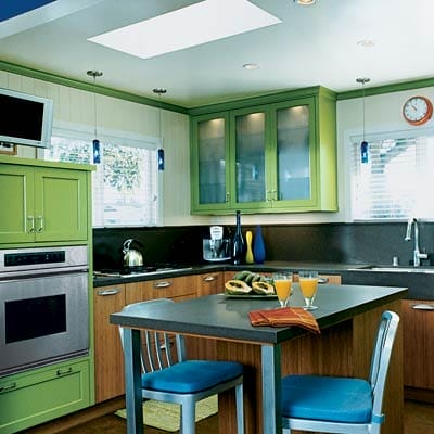 Mint green modern cabinets with clean minimalist lines.