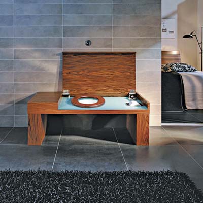 Toilet with wood veneer lid.