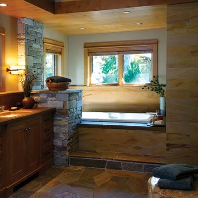 Spa-like bathroom with stone details.