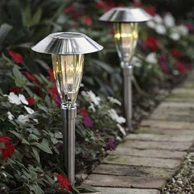 using solar powered walkway lights to brighten up an exterior