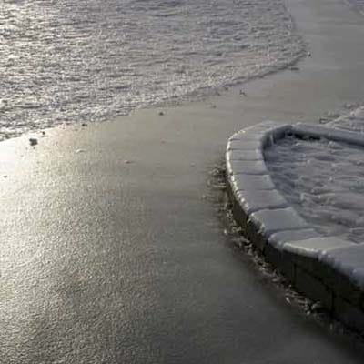 ice on a walkway to a house