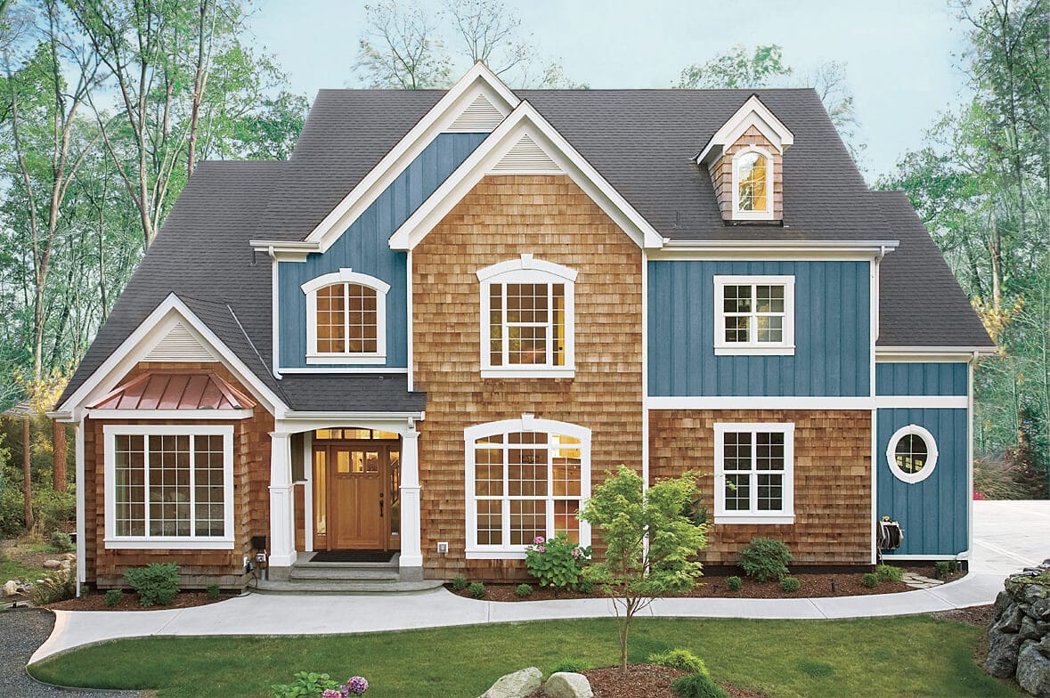a house with wood shake and blue stain