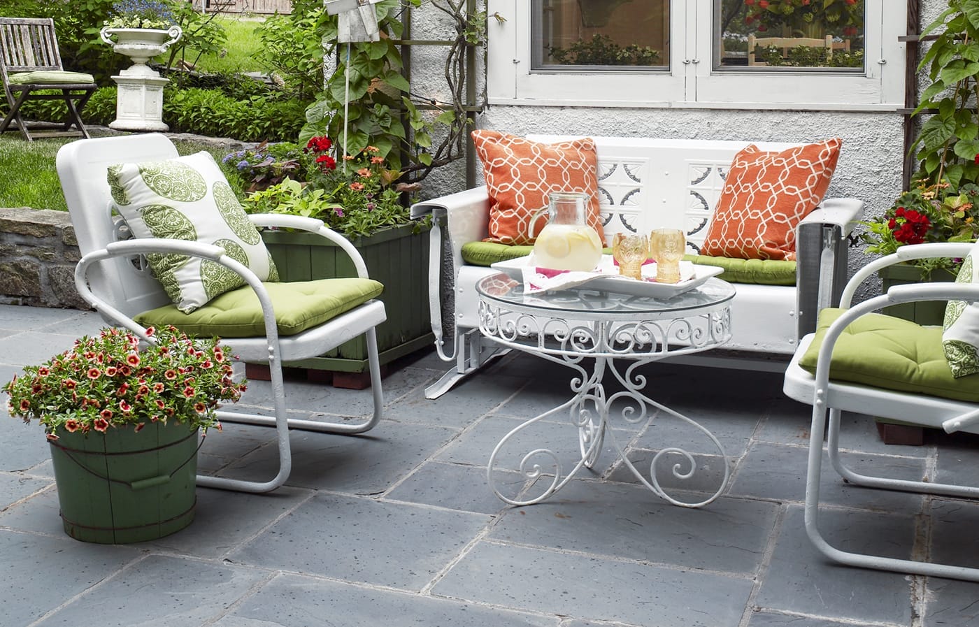 Outdoor patio with vintage furniture.