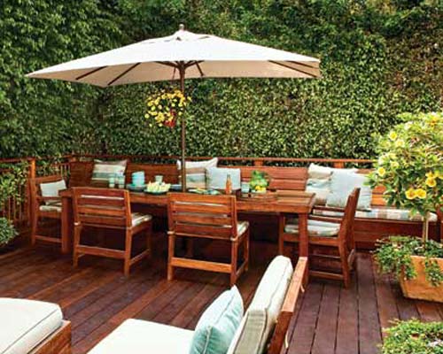 A deck with a built in table.