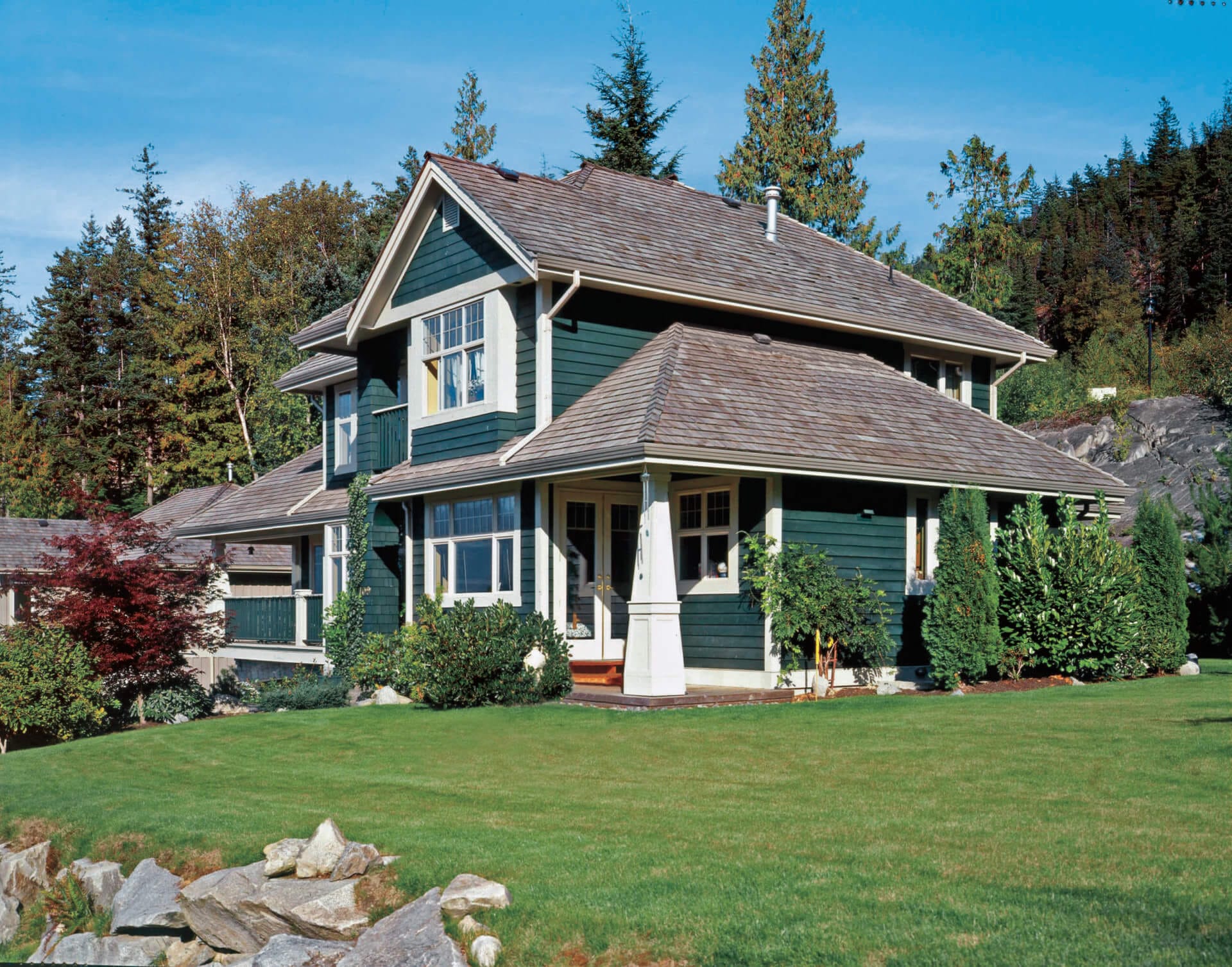 a hunter green stain on the exterior of a house