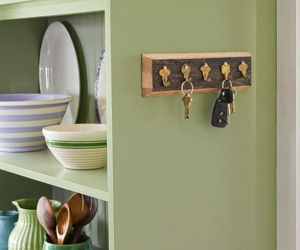 Wall mounted hooks made out of keys.