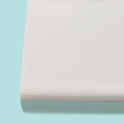 White subway tile with rounded shoulder edges.