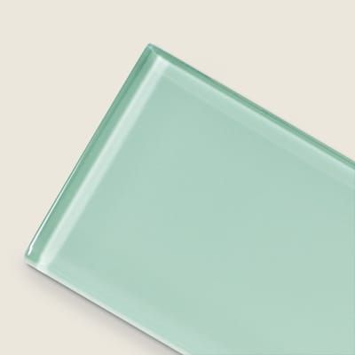 Rain-colored glass subway tile showing translucent finish.