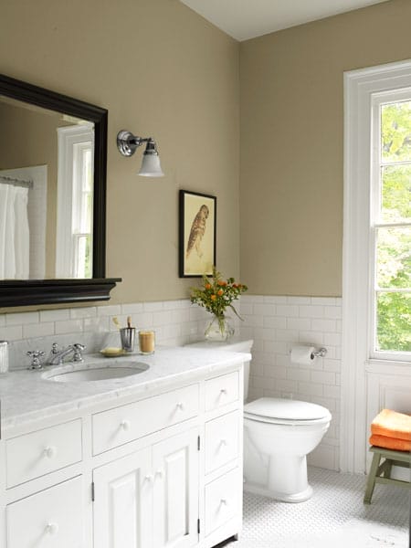 An upstairs bathroom with subway tiling