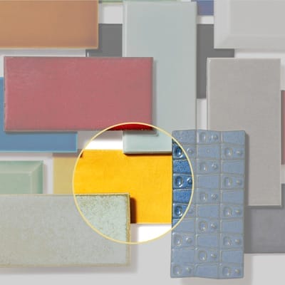 Yellow subway tile sample with banana-colored gloss finish.