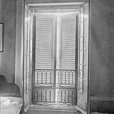 Storm shutters on a window