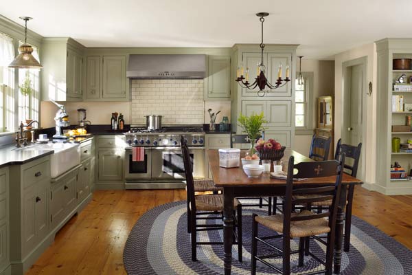 A renovated kitchen with green cabinets