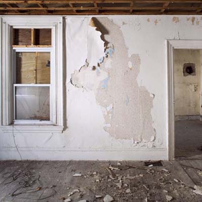 Rear bedroom with blocked window.