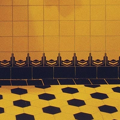Bold tile makes the modern bathroom uniquely art deco.