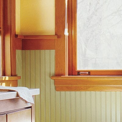 An earth toned color pallet can make a modern bathroom look more vintage.