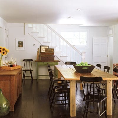 A large table made from salvaged floorboards