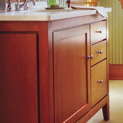 Craftsman style warm wood accents in a bathroom.