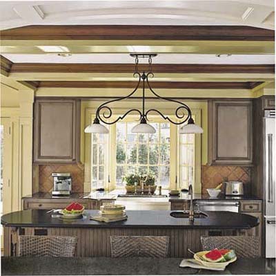 Tudor Revival kitchen with breakfast bar and expanded storage space.