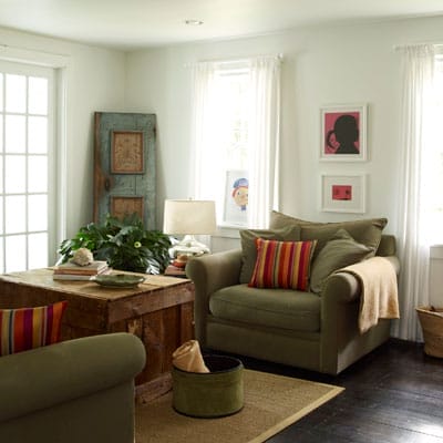 An oversized green chair in a sitting area