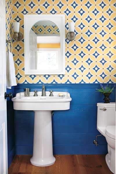 A small bathroom with hand painted canvas cloth.