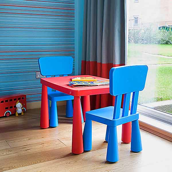 a plastic kids table and chairs