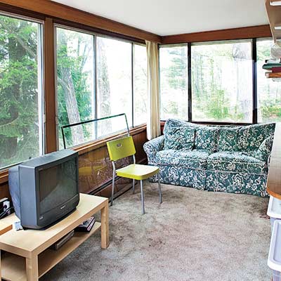Sunporch before renovation showing narrow 7-foot deep space with windows overlooking Charles River.