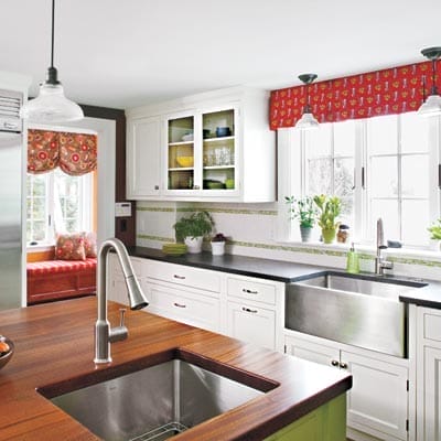 Kitchen after renovation showing dual prep areas.