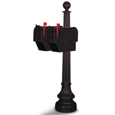 Two black dome-shaped mailboxes on one post which each have a newspaper holder on them.