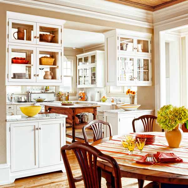 Image of built-in servers, cupboards, and pass-through which can make entertaining at your home easier