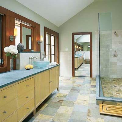 Aqua-blue countertops and shower area.
