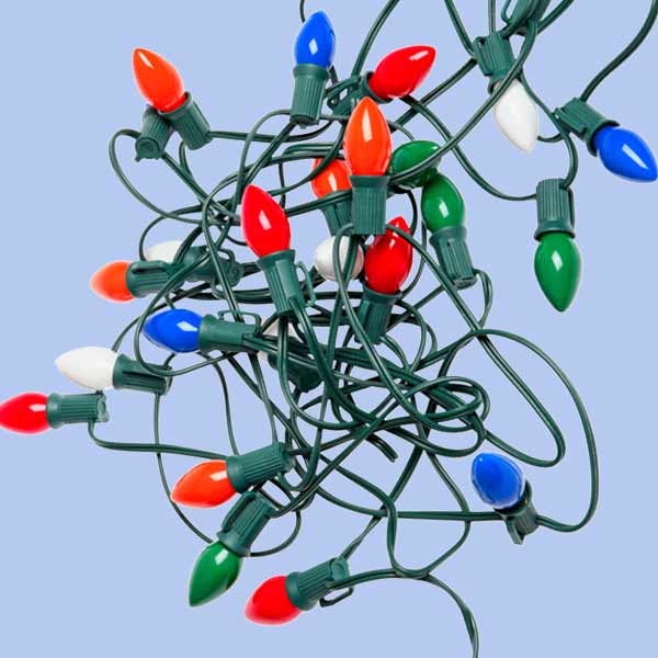 A set of tangled Christmas lights against a blue background.