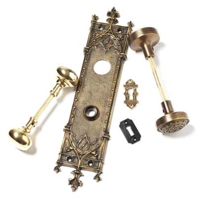 A deconstructed antique entry set with an intricate back panel.