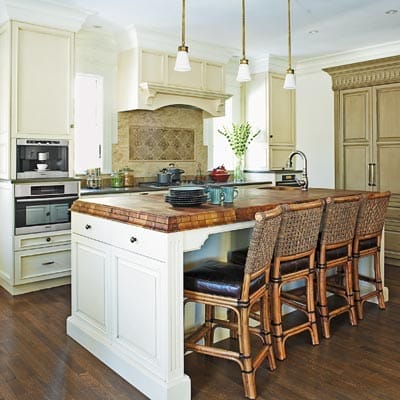 Kitchen with large island and pendant lighting.